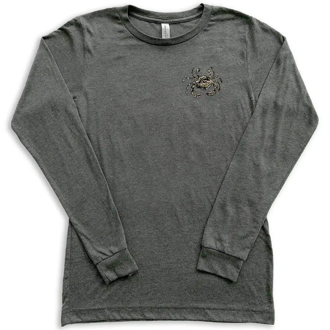 The front of a heather gray long-sleeve shirt with a small black and gold saints colored crab on the front left chest
