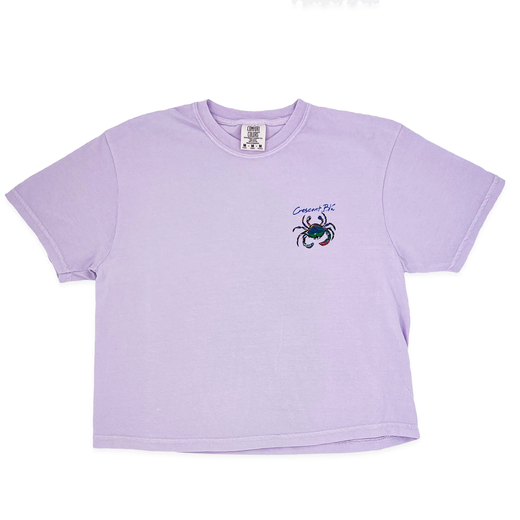 Front of a ladies tee in orchid colors with the Crescent Blu multi-colored Signature Crab logo on the upper left chest.