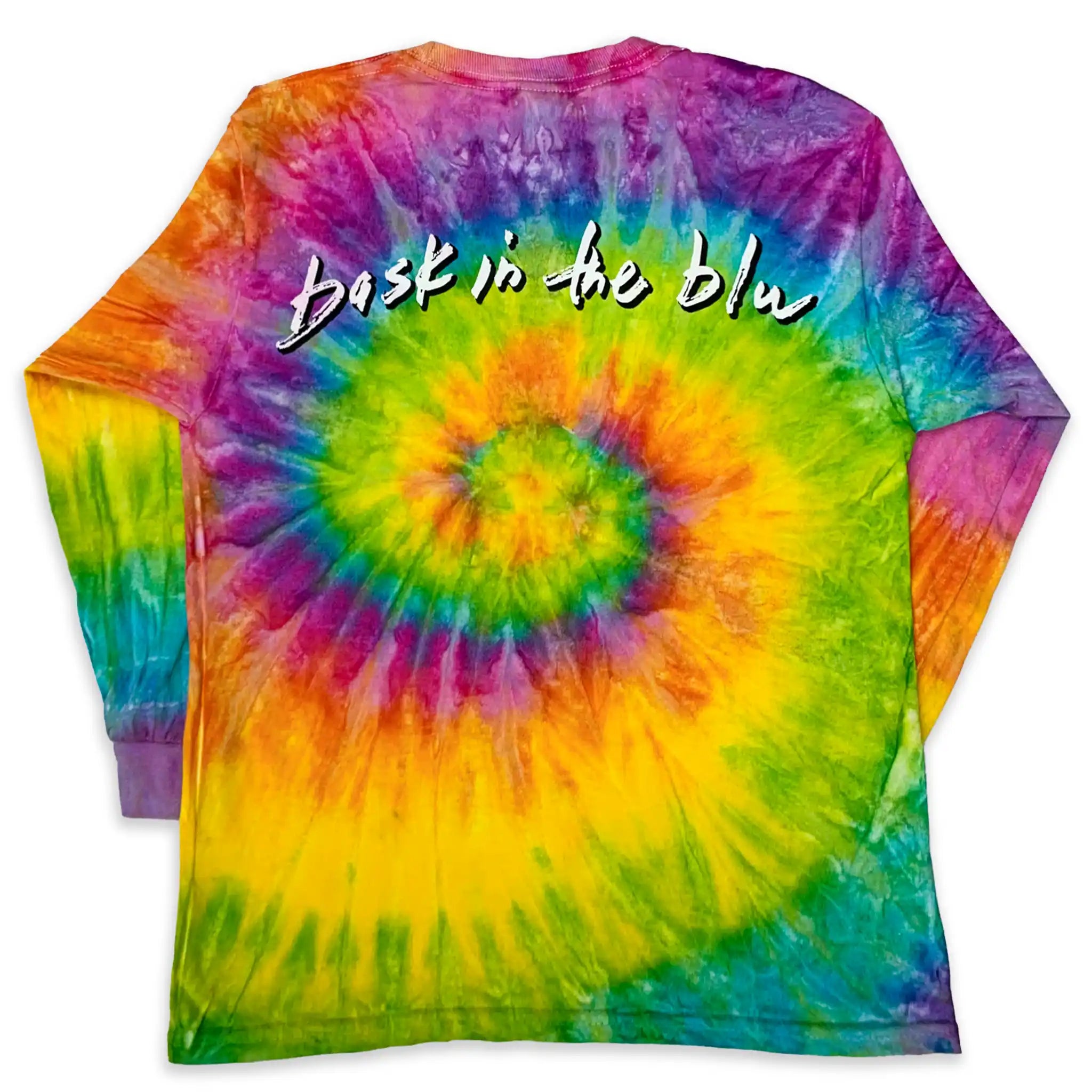 The back of a long sleeve rainbow tie-dye shirt with 'Bask in the blu' text in white