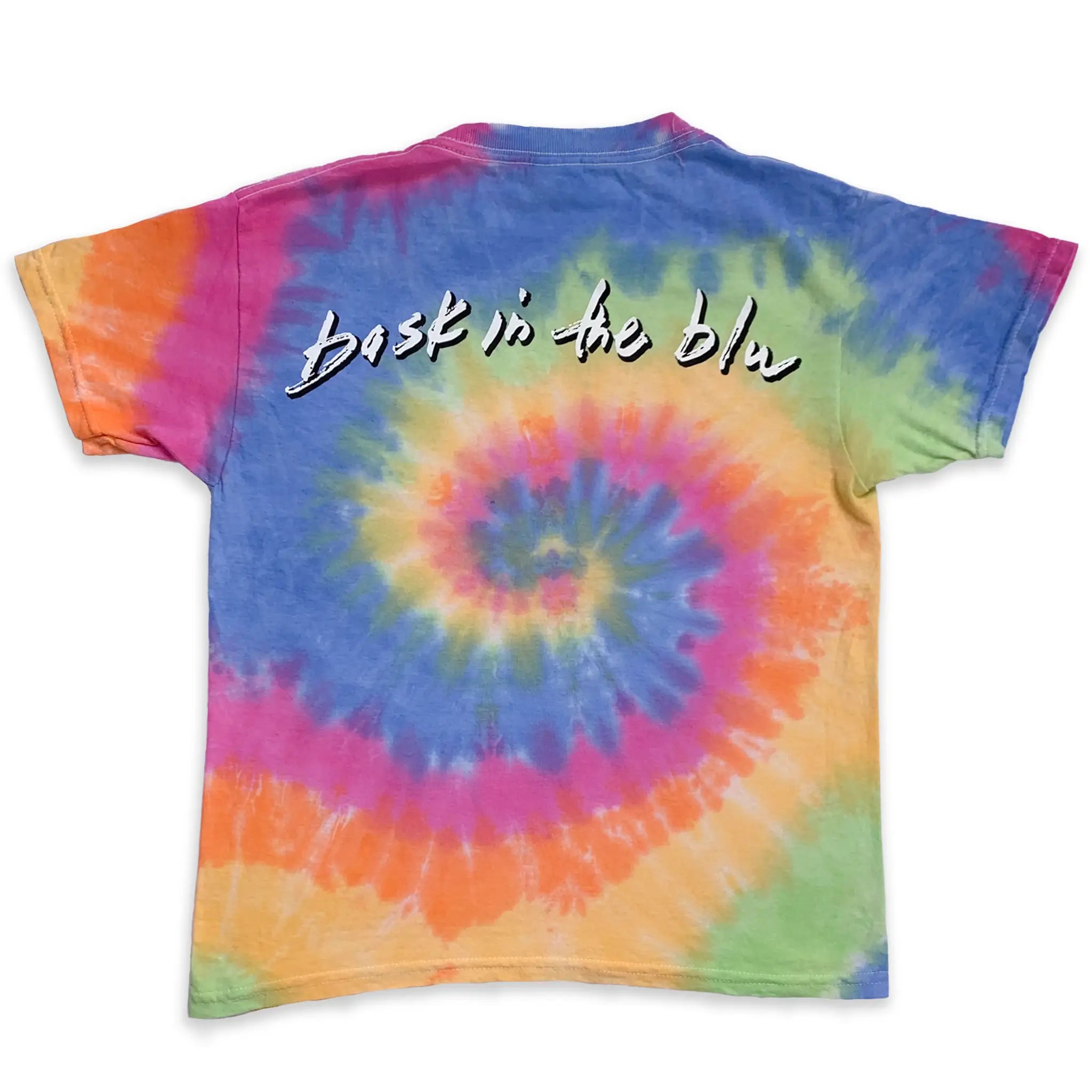 A youth short sleeve pink, green, orange and blue tie-dye t-shirt with spiral pattern and white text on the back