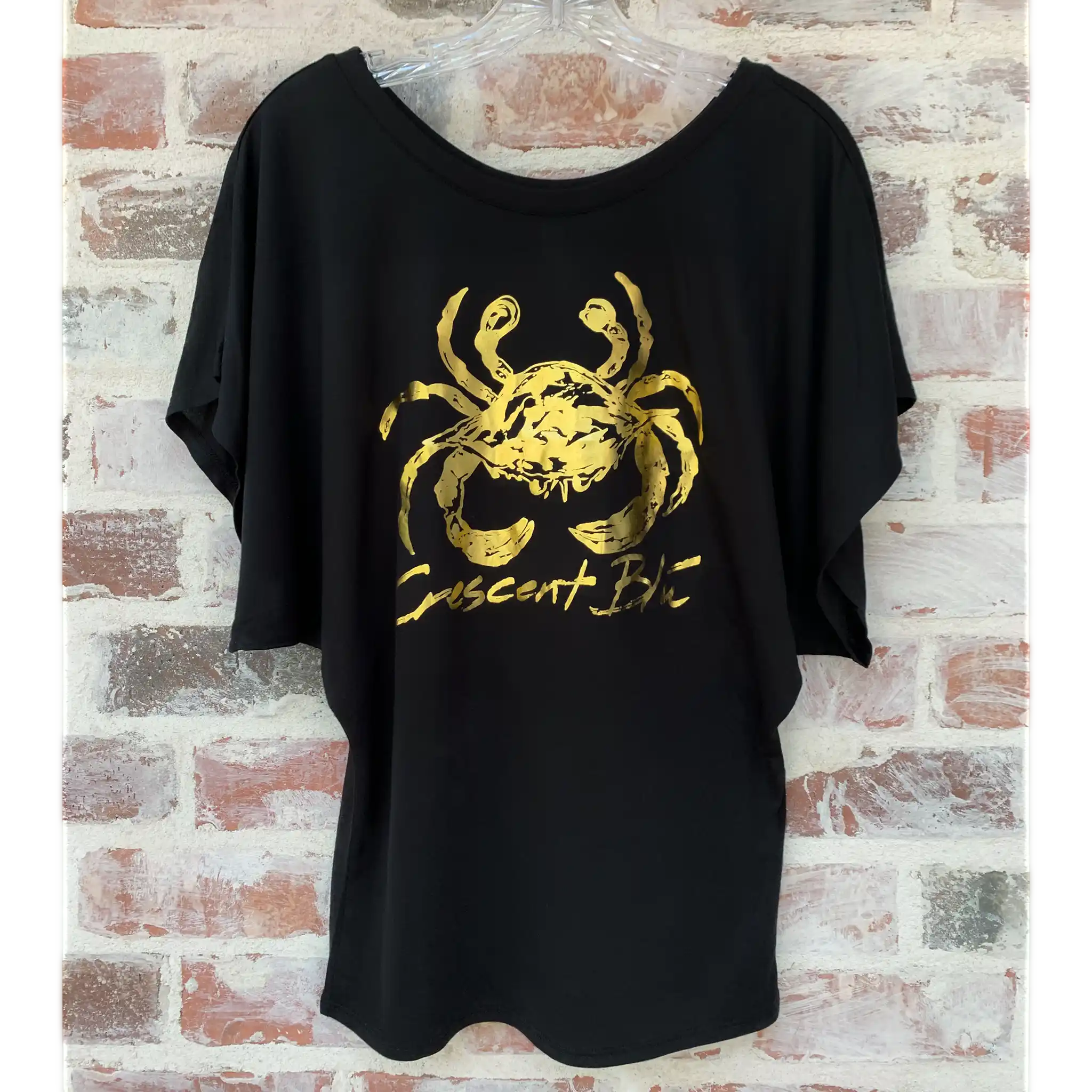 Front view of Crescent Blú Black & Gold Metallic Saints Crab short sleeve dolman top