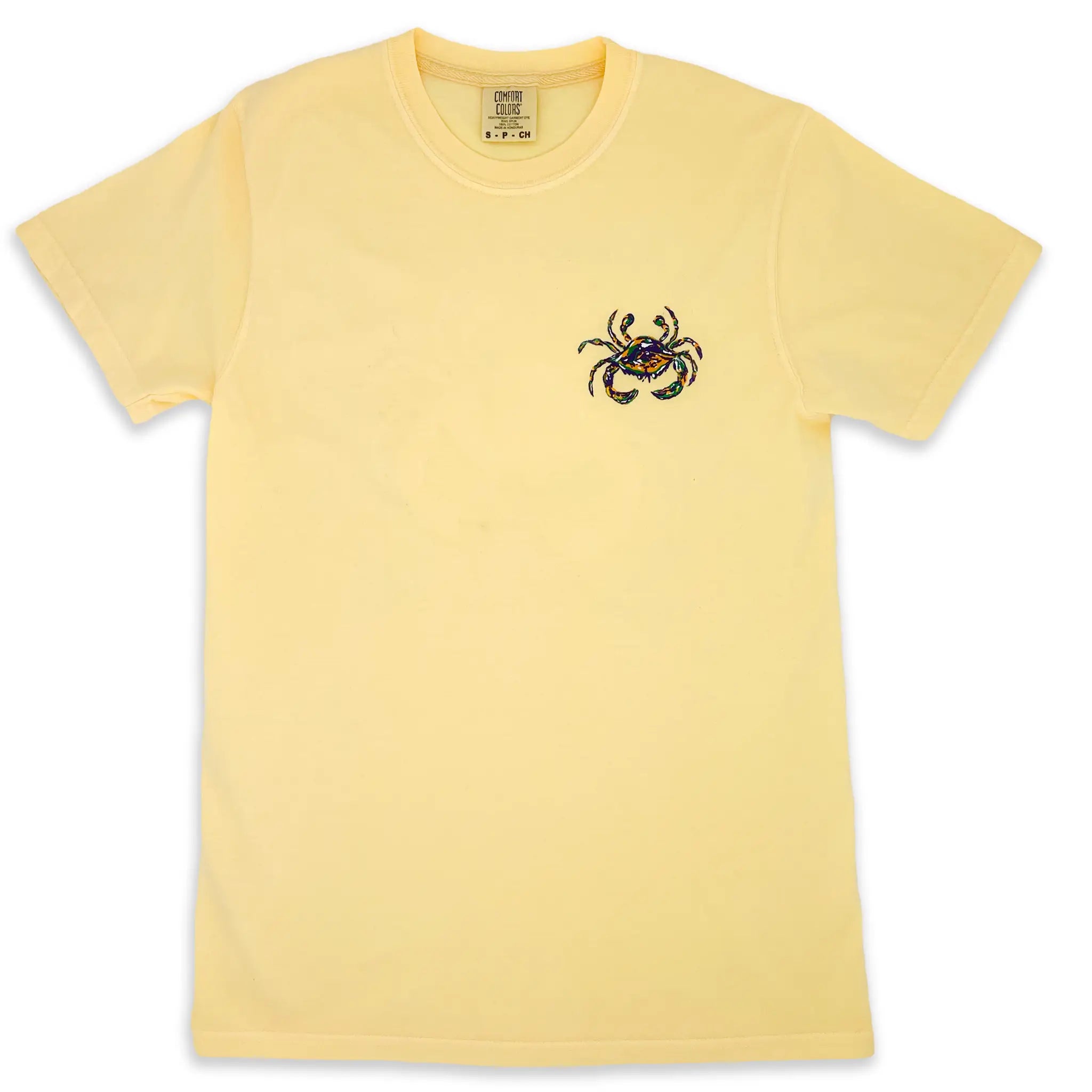 Short sleeve butter colored shirt on the left chest is a Mardi Gras Crab.
