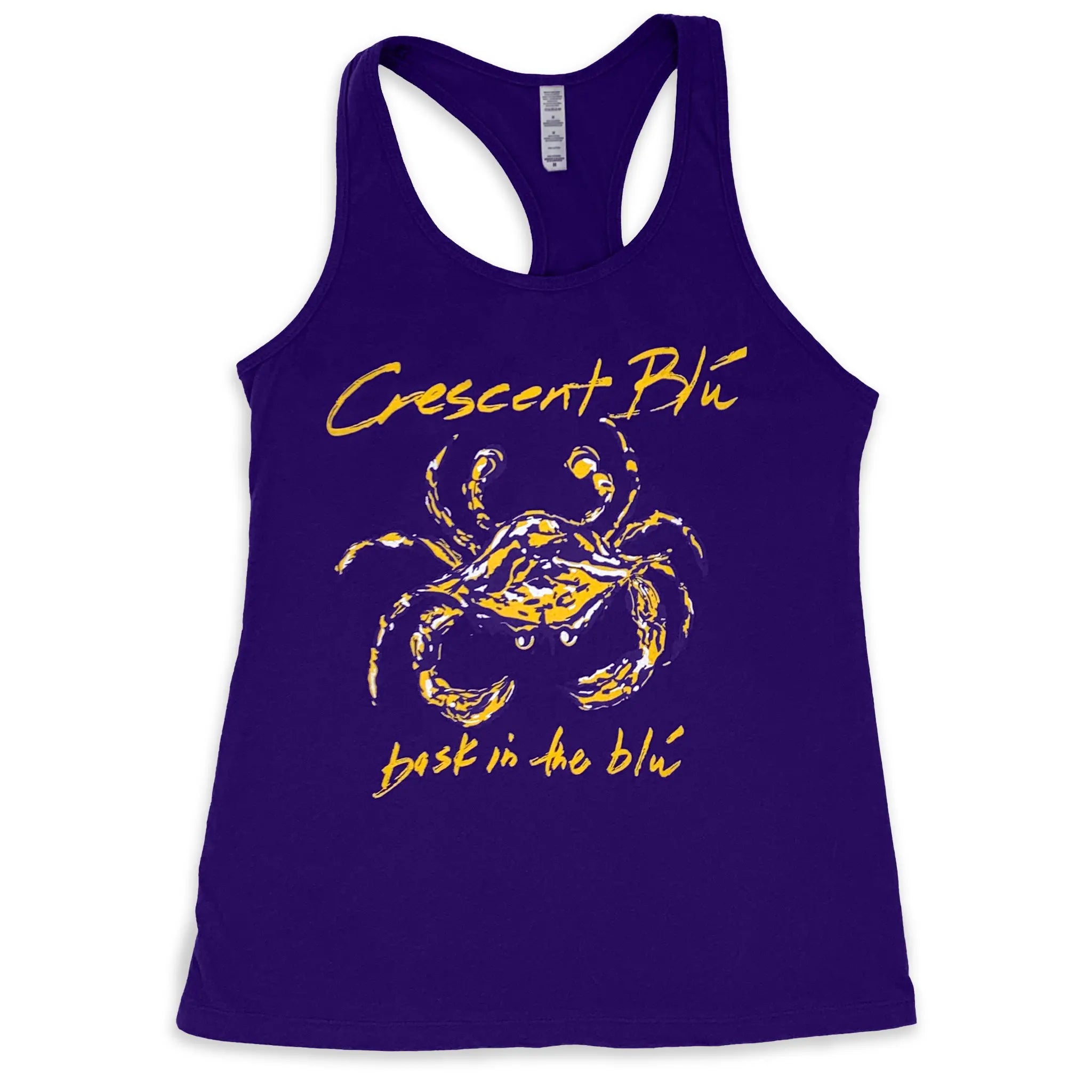 Front view of women's racer back tank top with large crescent blu purple and gold crab logo on the front
