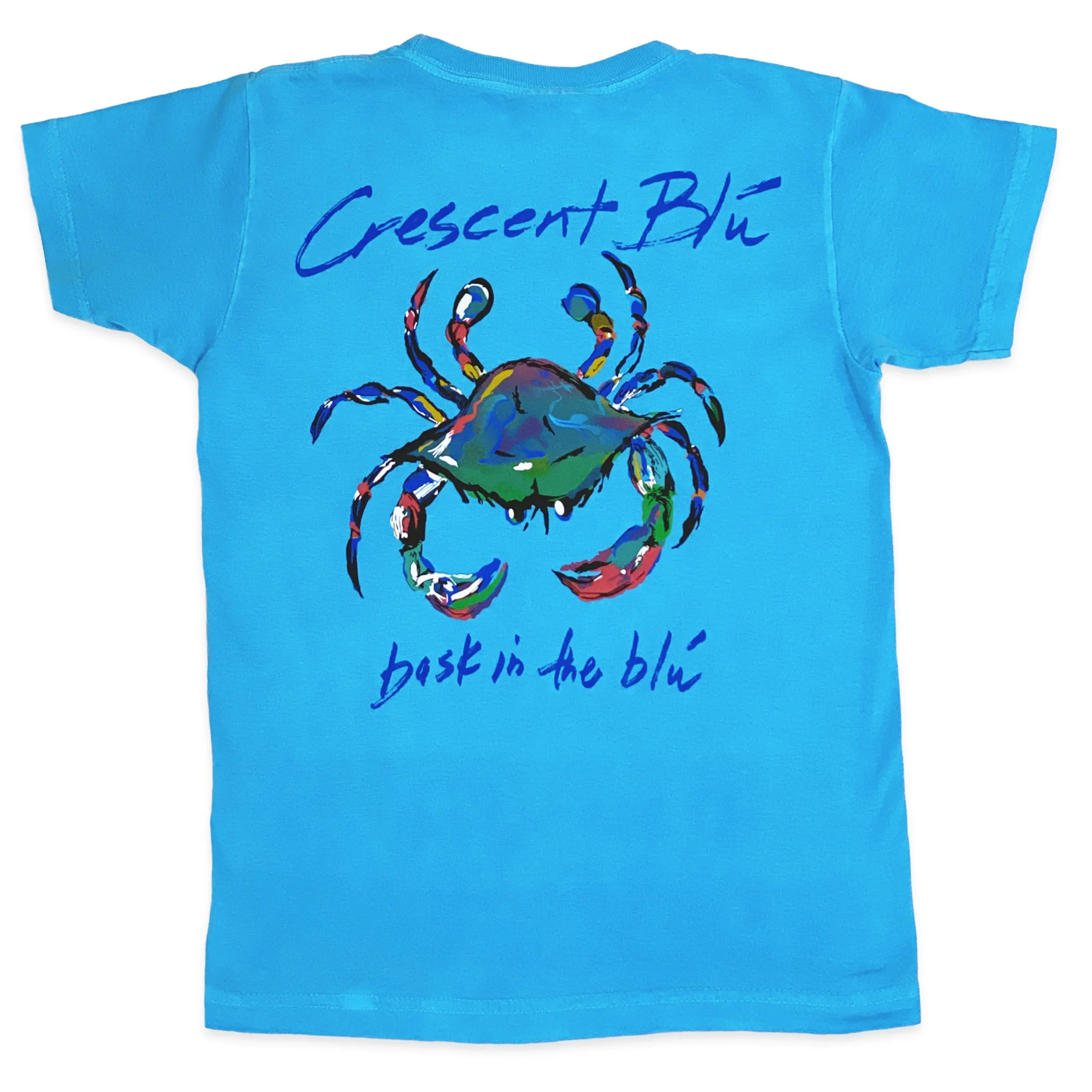 A colorful blue crab with Crescent Blu written above it and bask in the blue written below it  is centered on the back of a youth shirt that is Royal Caribe color.