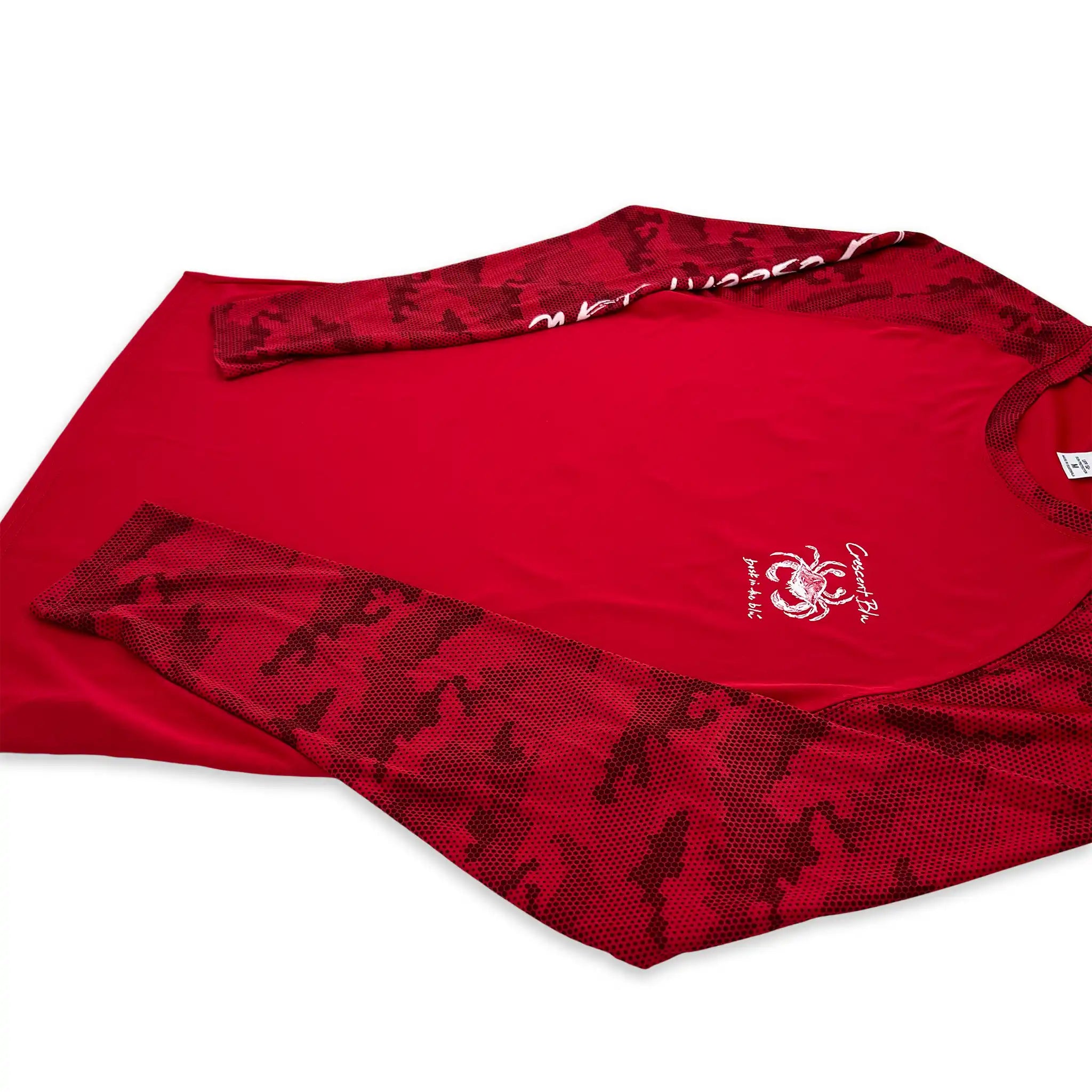Side flat view of Crescent Blú Sneaux Crab long sleeve red sun shirt with Hex Camo pattern