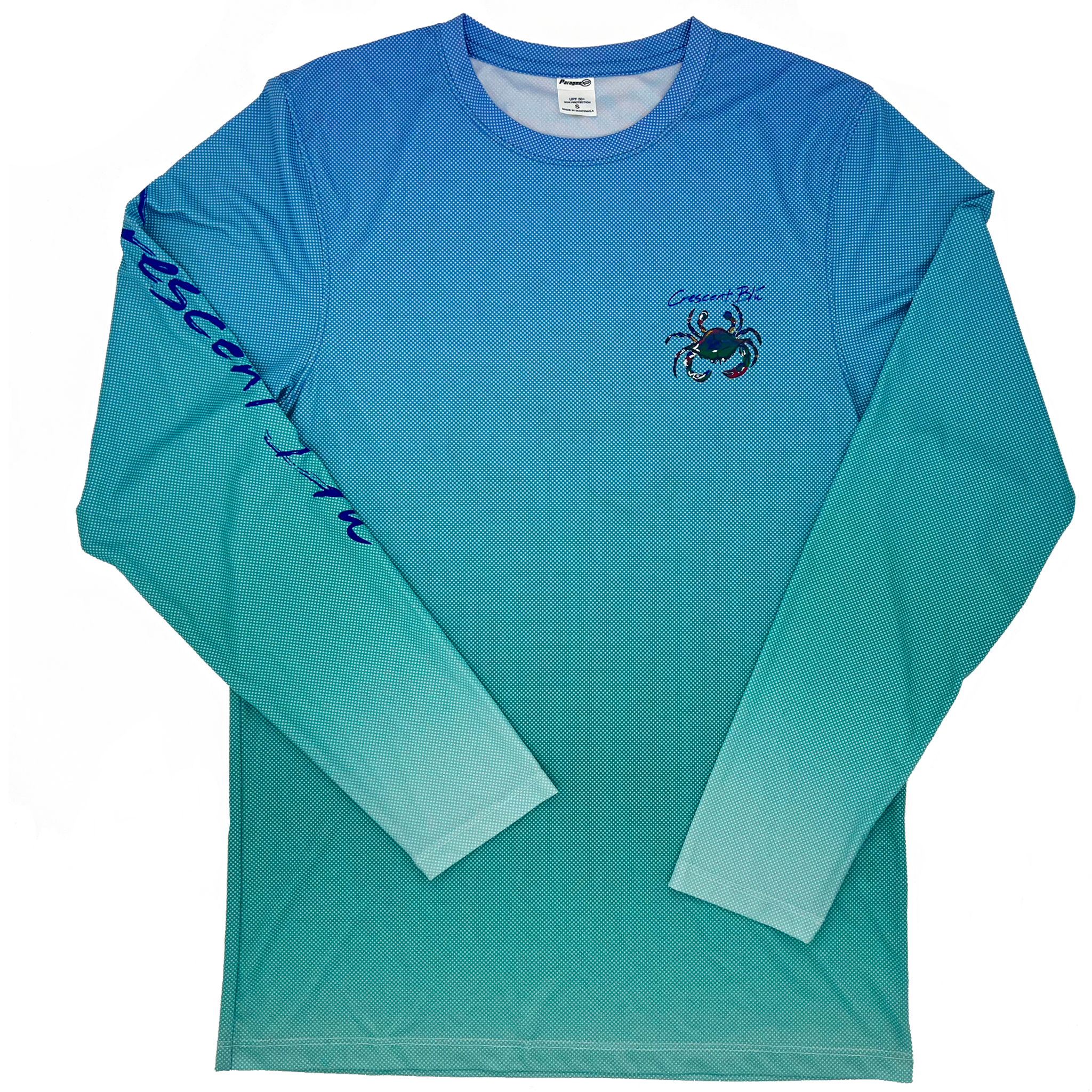 Long sleeve with a gradient color background from blue at the top to teal at the bottom. A blue crab is on the left chest and you can see the partial writing of Crescent Blú on the right sleeve.