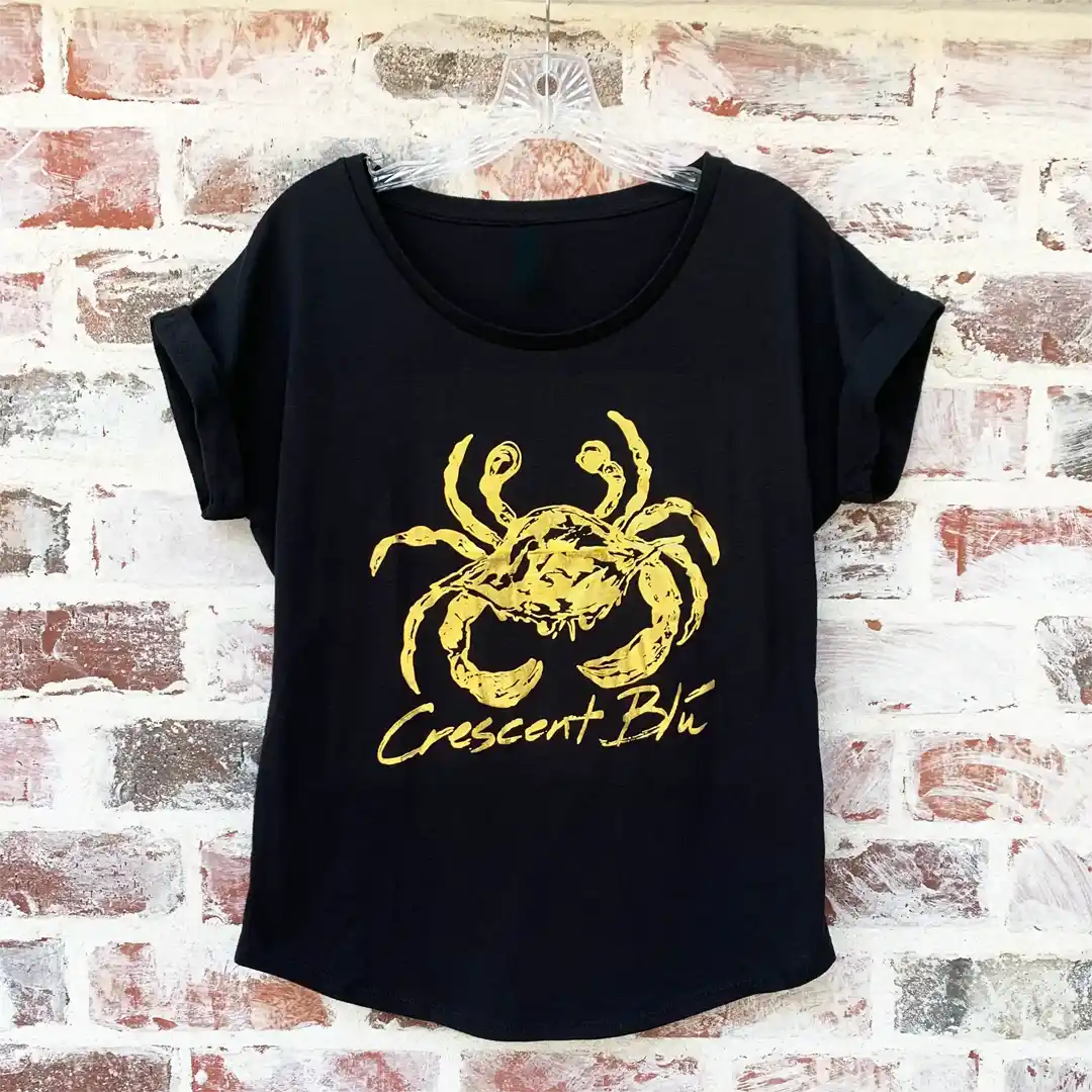 Front view of Crescent Blú Black & Gold Metallic Saints Crab short sleeve dolman roll sleeve top