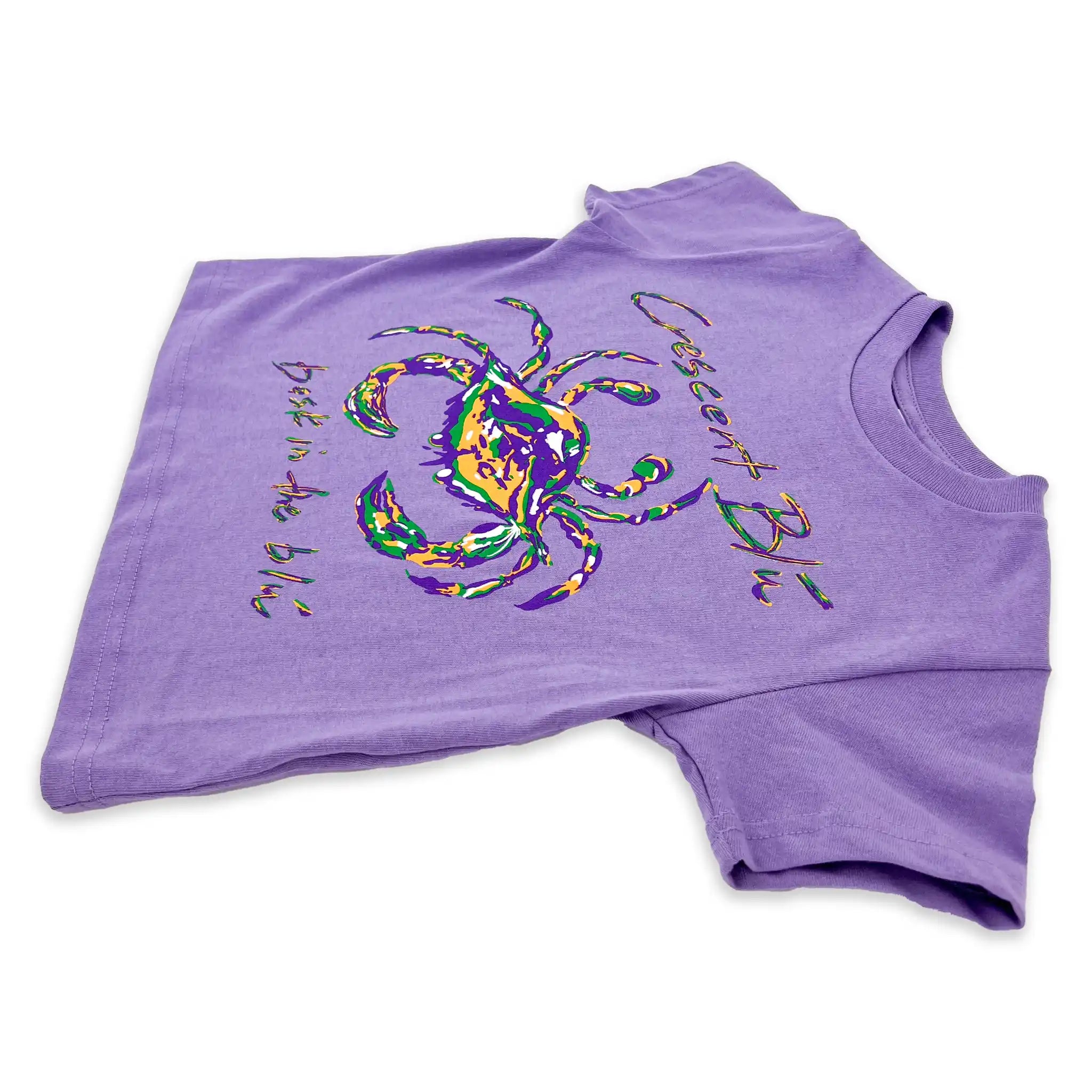 A short sleeve lavender t-shirt for kids wtih a Mardi Gras crab on the front.