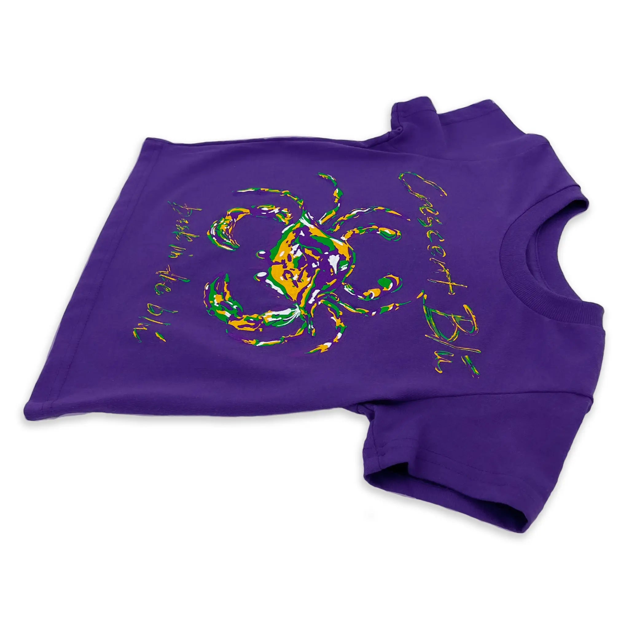 Flat side angled view of a kids toddler purple mardi gras t-shirt.