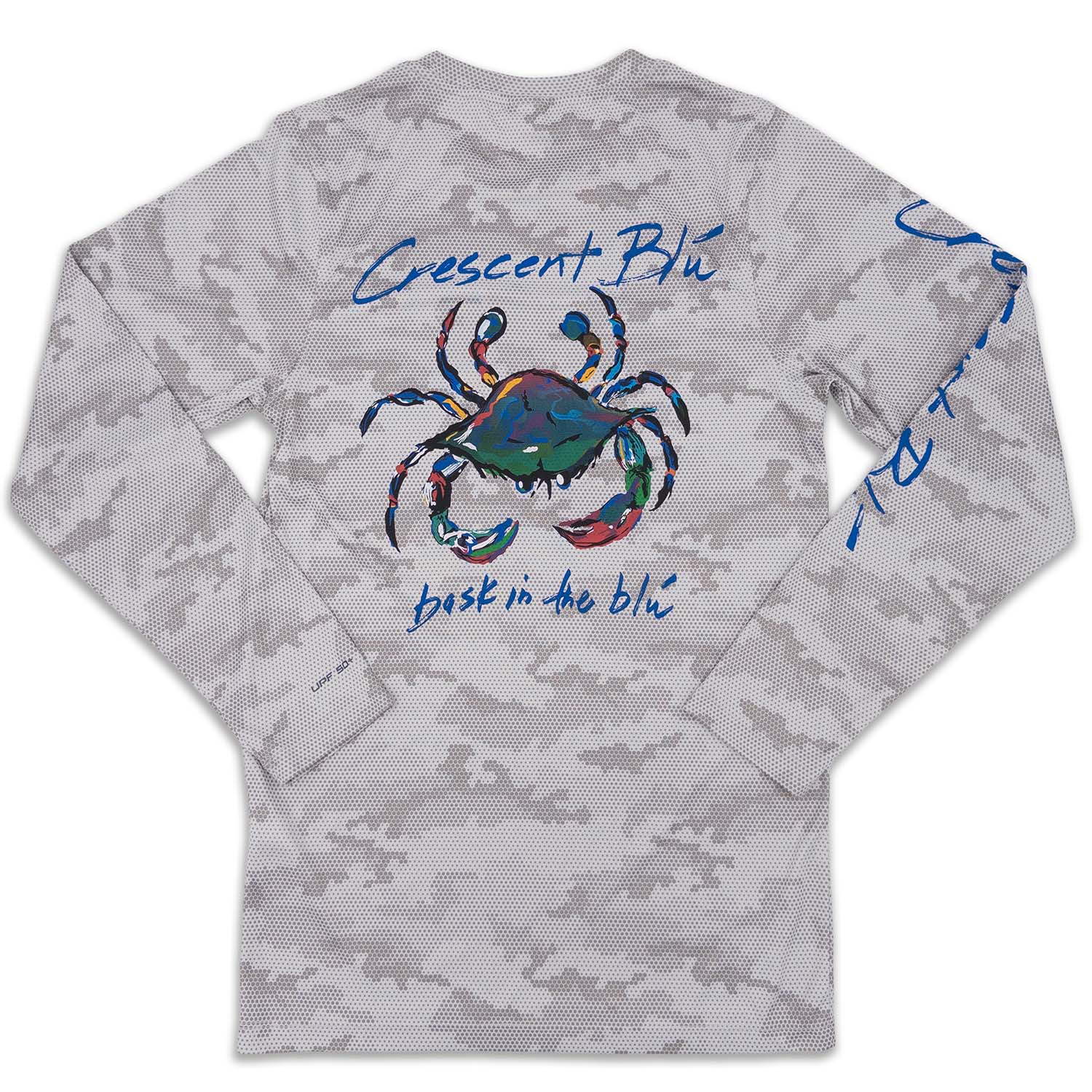 The back of a pin dot grey camo sun shirt with the Crescent Blu Signature Crab logo in the center and Crescent Blu written on on sleeve. 