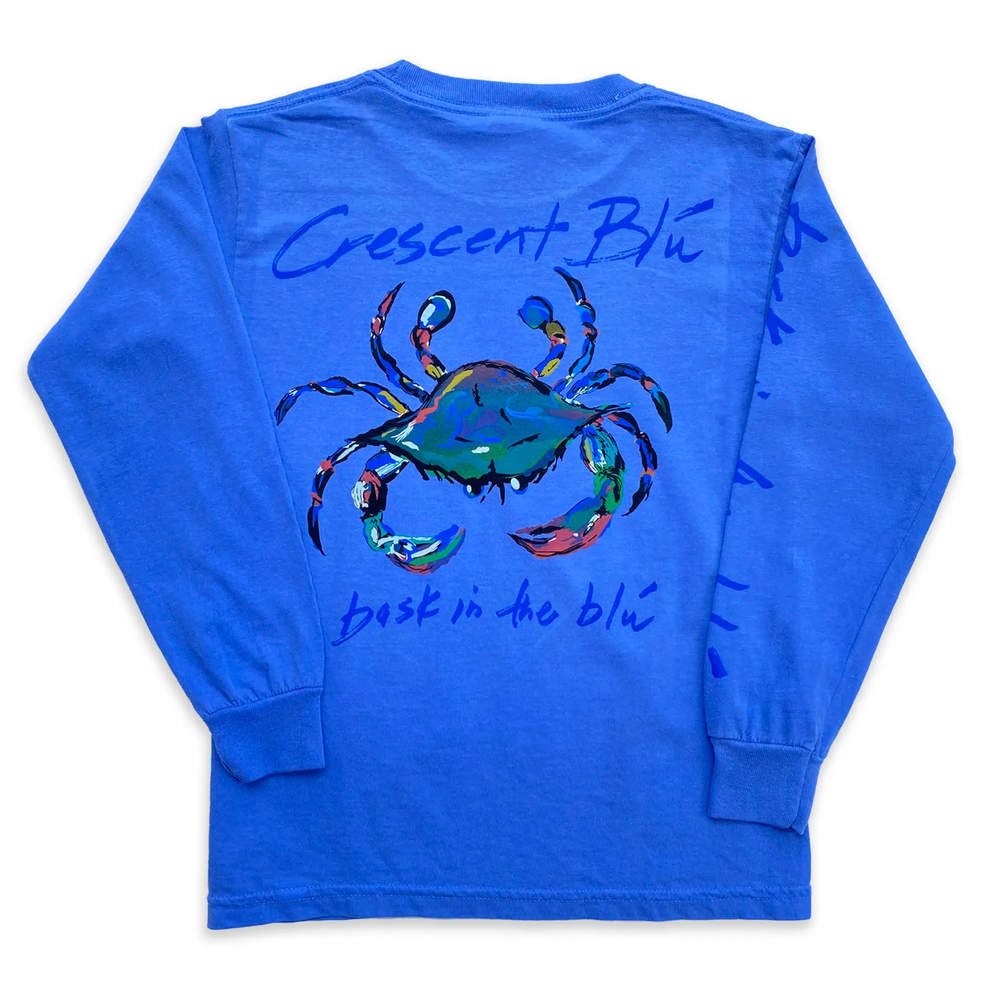 A large Crescent Blu blue crab logo on the back of a youth long sleeve flo blue t-shirt. 