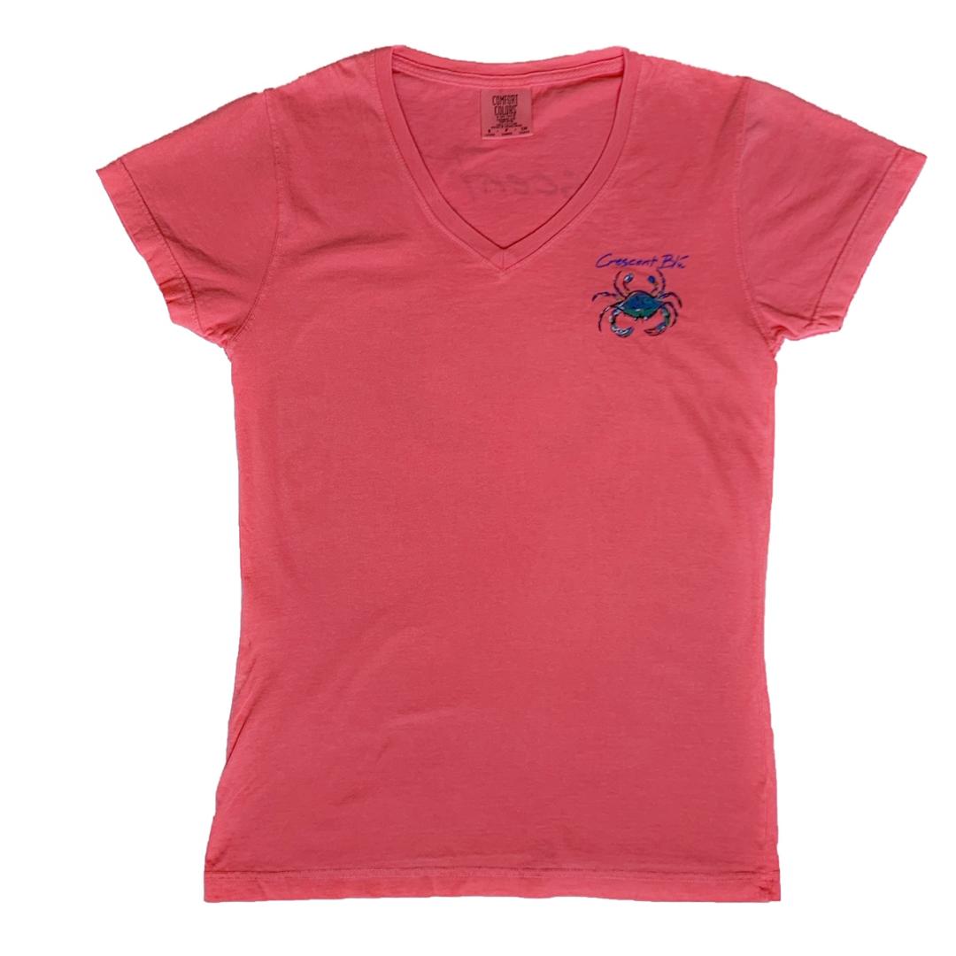 View of front of Watermelon colored Ladies cut V-neck short sleeve shirt with small Crescent Blu signature crab logo on upper left chest.