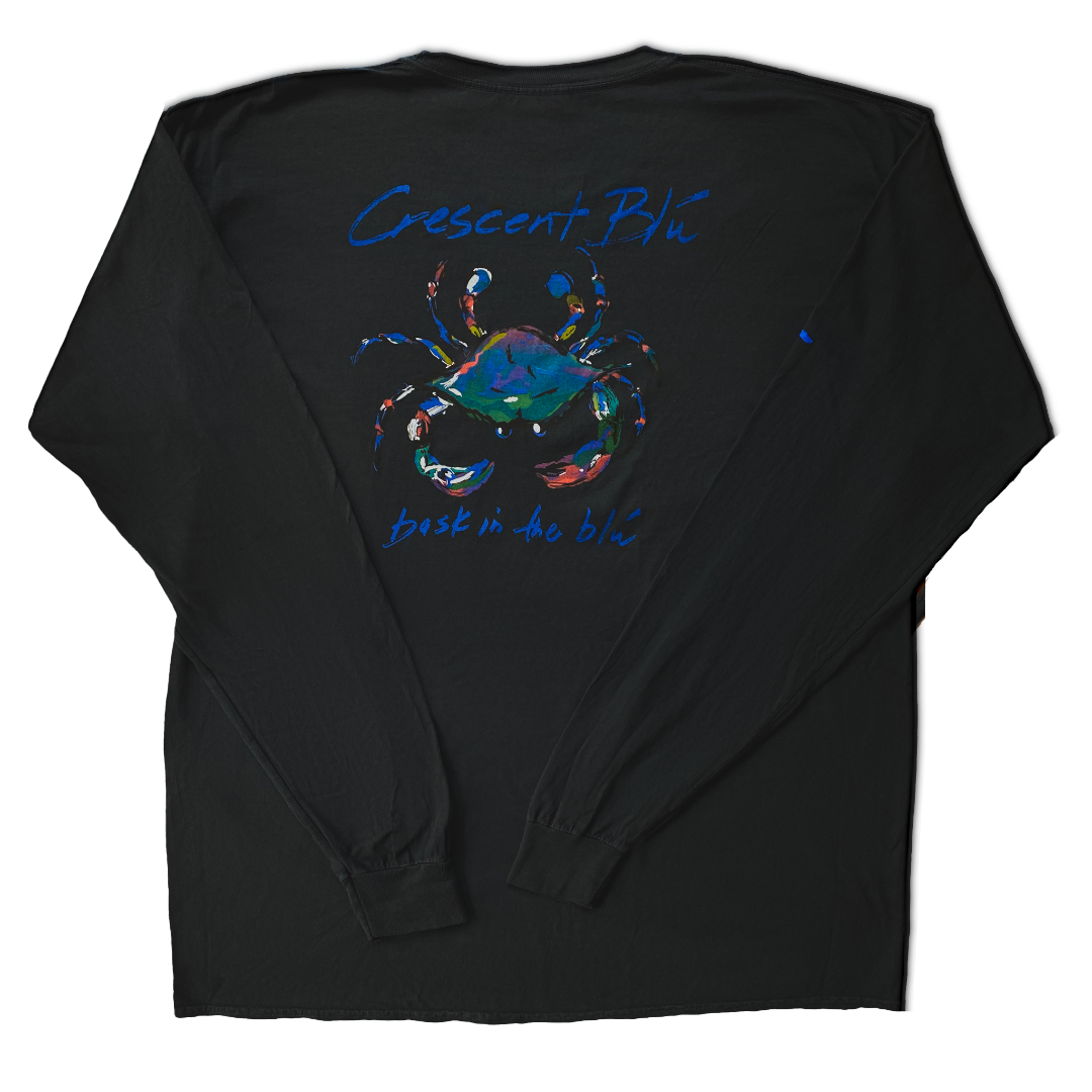 Back view of a Black, adult, long sleeve t-shirt with large multi-colored Signature Crab logo printed on the back with Crescent Blu and Bask in the Blu printed above and below respectively. 