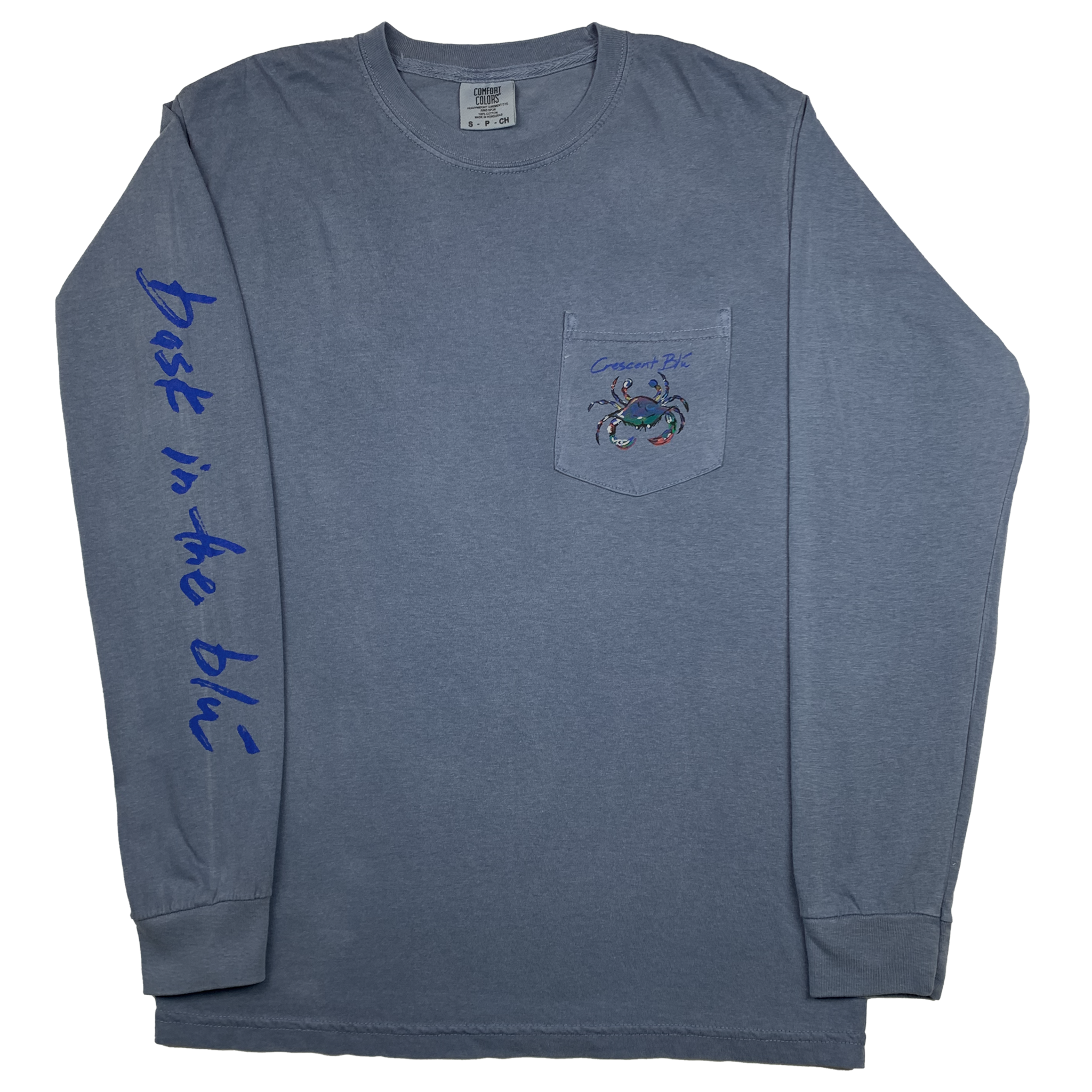 Adult, long sleeve, Blue Jean colored T-shirt with Bask in the Blu printed along the right sleeve and a small multi-colored Crescent Blu  logo on a left upper chest pocket. 
